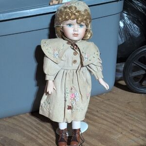 Charming Tan Doll with Embroidered Dress